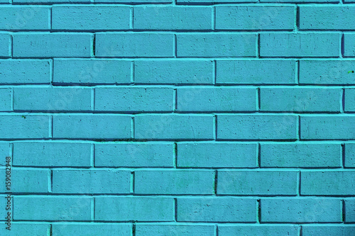 teal painted brick wall