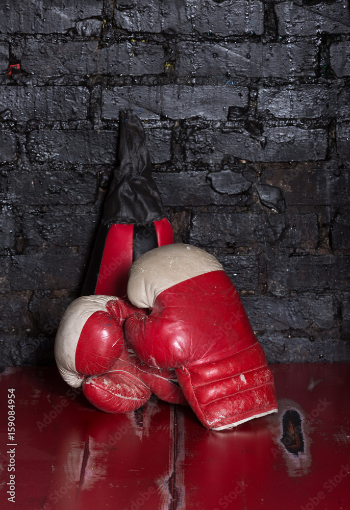 Old red boxing gloves