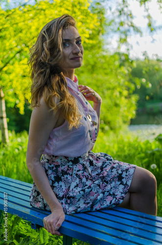 young and happy girl in the sunshine photo