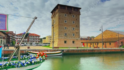 timelapse of tower on harbor channel