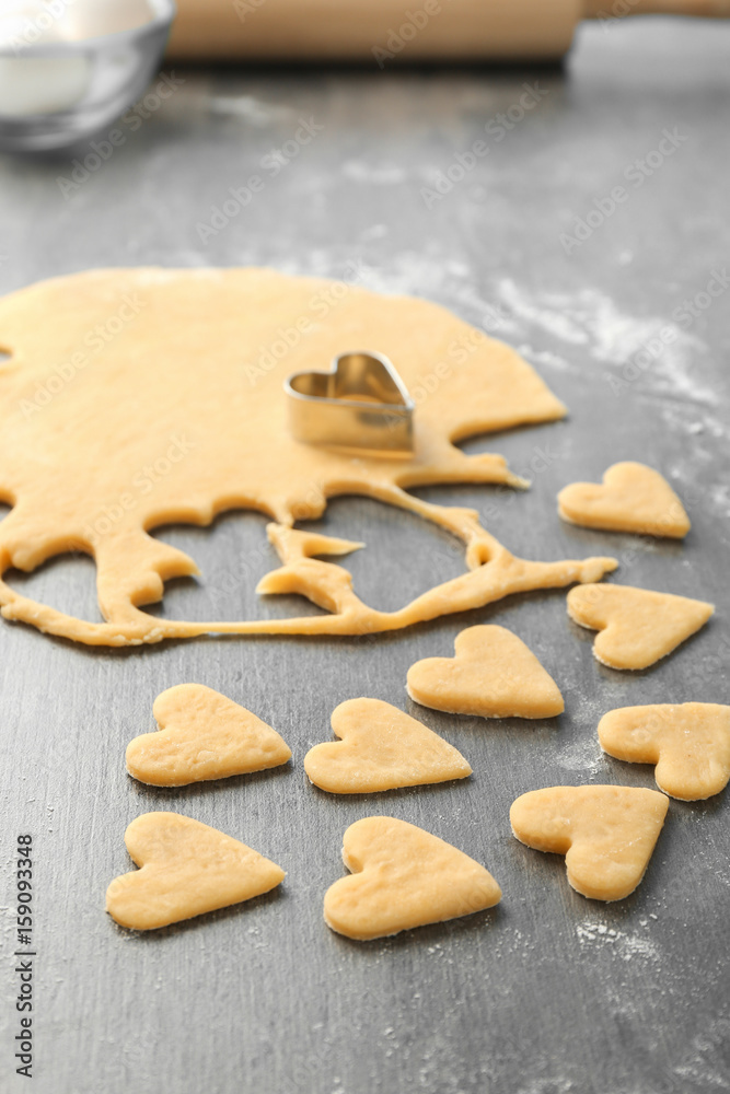 Preparing of butter cookies on table