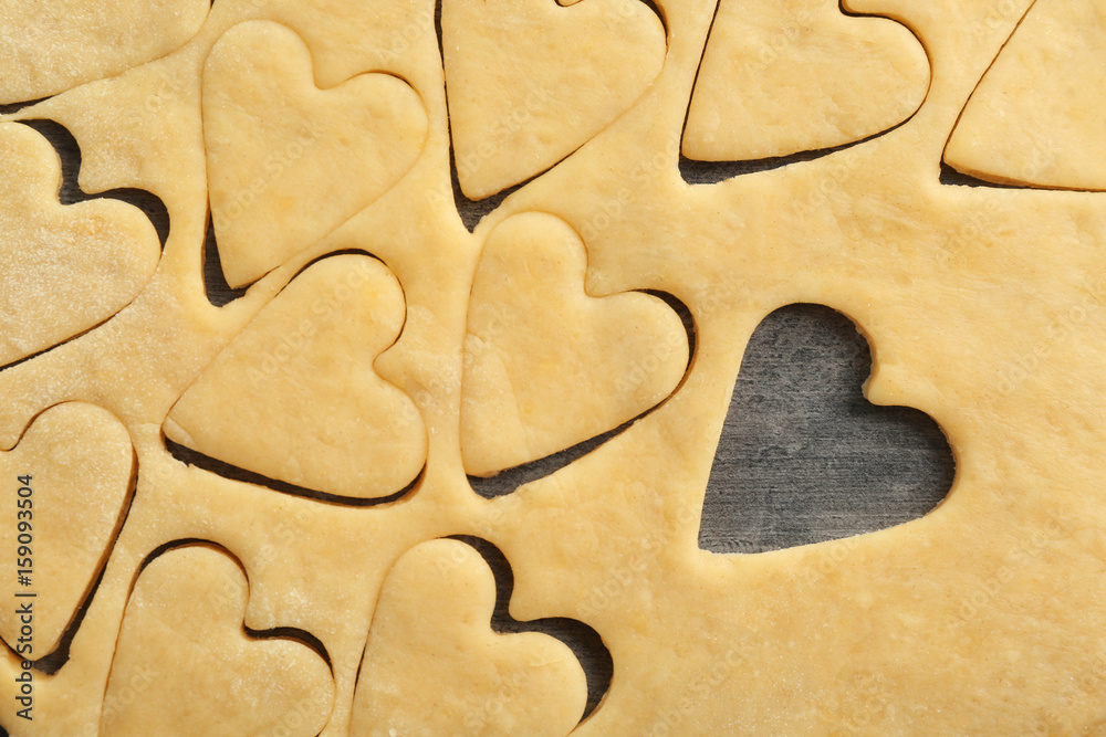 Preparing of butter cookies on table