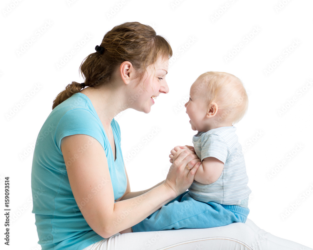 Portrait of mother and baby son laughing and playing Portrait of mother and baby son laughing and playing