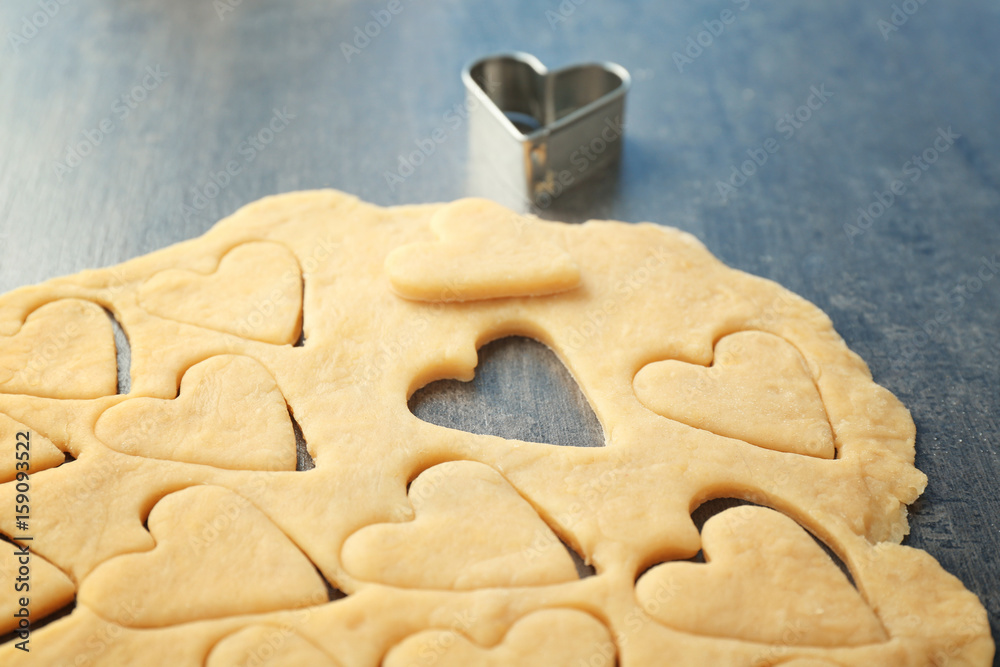 Preparing of butter cookies on table