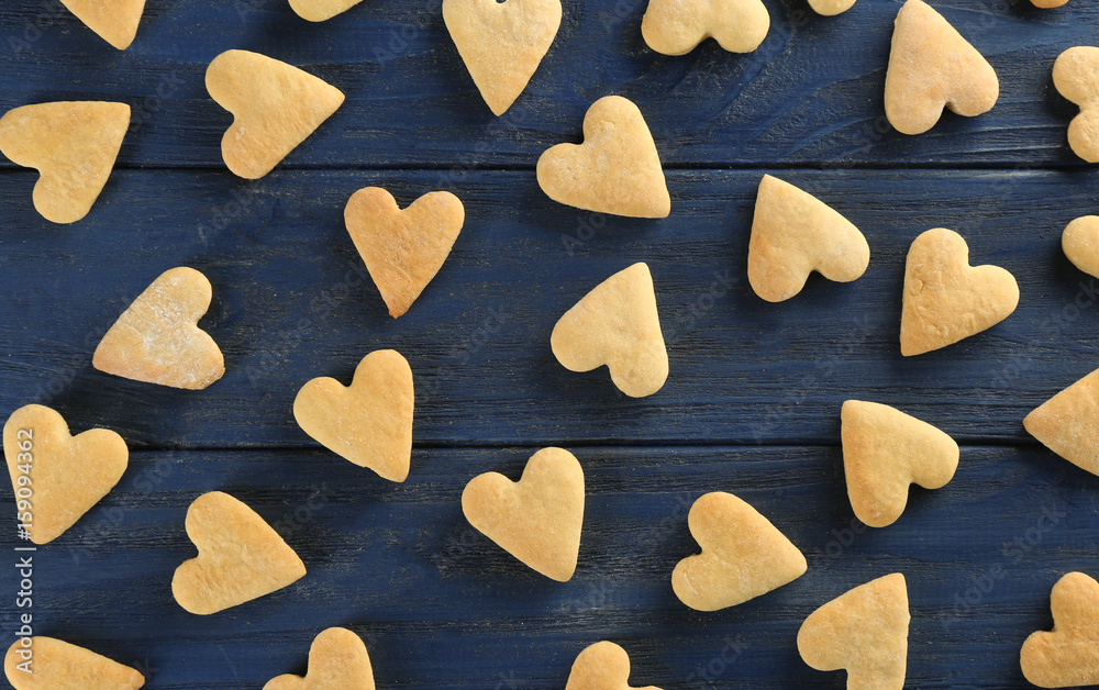 Heart shaped butter cookies on wooden background Heart shaped butter cookies on wooden background