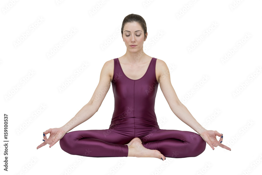 Woman practicing yoga in Muktasana pose Woman practicing yoga in Muktasana pose