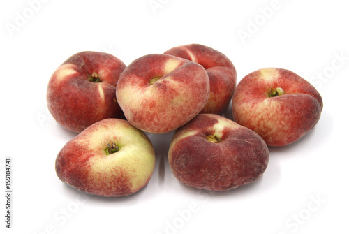 Bunch of Doughnut Peaches, flat, ripe - Background isolated white - Text space, copy space