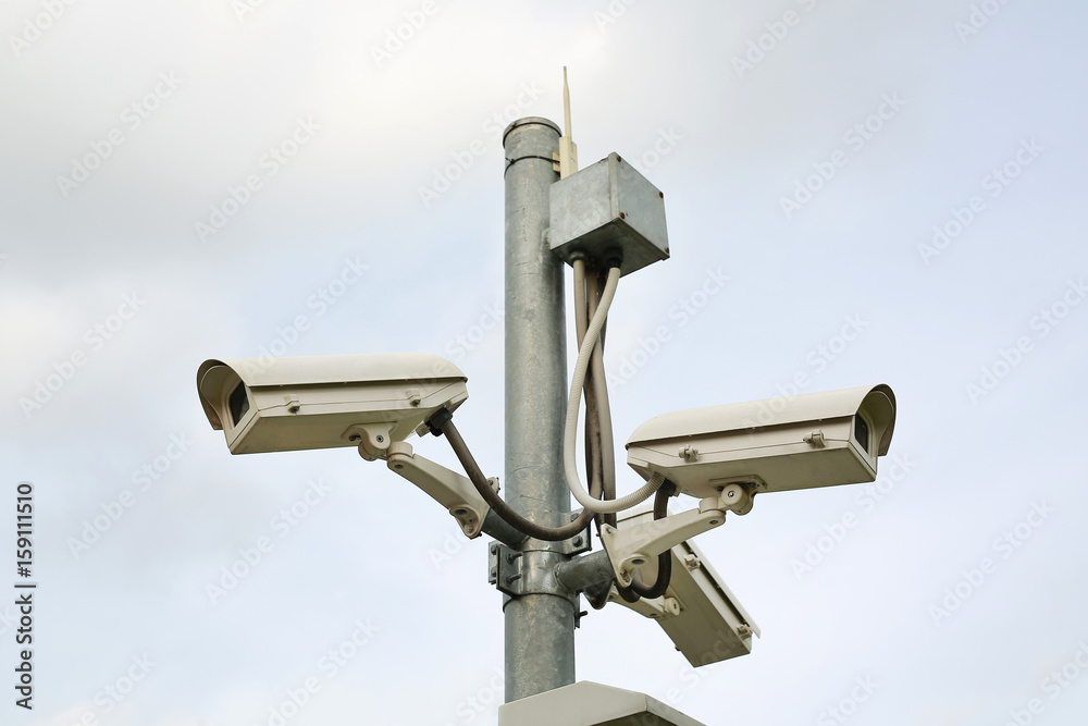 CCTV Security Camera on the pole outdoor. CCTV Security Camera on the pole outdoor.