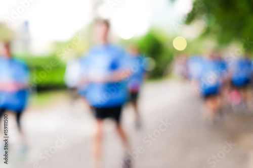 Blurred leg movement marathon running on road