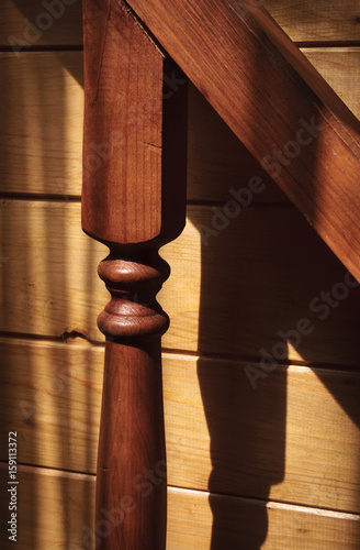 Wooden balusters on the stairs of country house