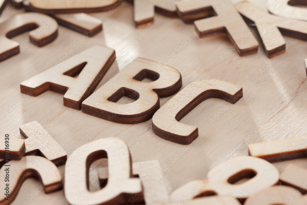 Back to school concept. Alphabet made of wooden letters Back to school concept. Alphabet made of wooden letters