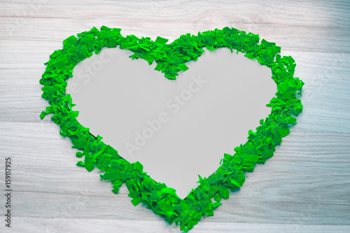 Red heart of confetti - white copy space, background
