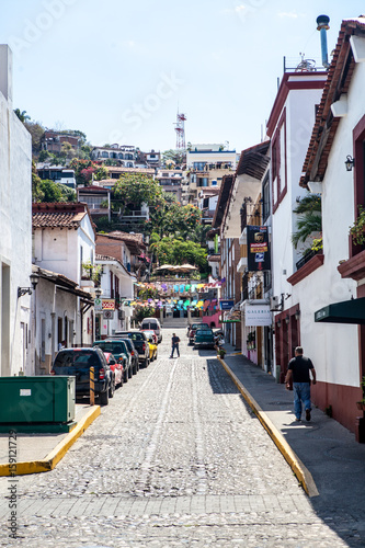 Mexican street in Puerto Vallarta papel picado colorful paper banner folk art