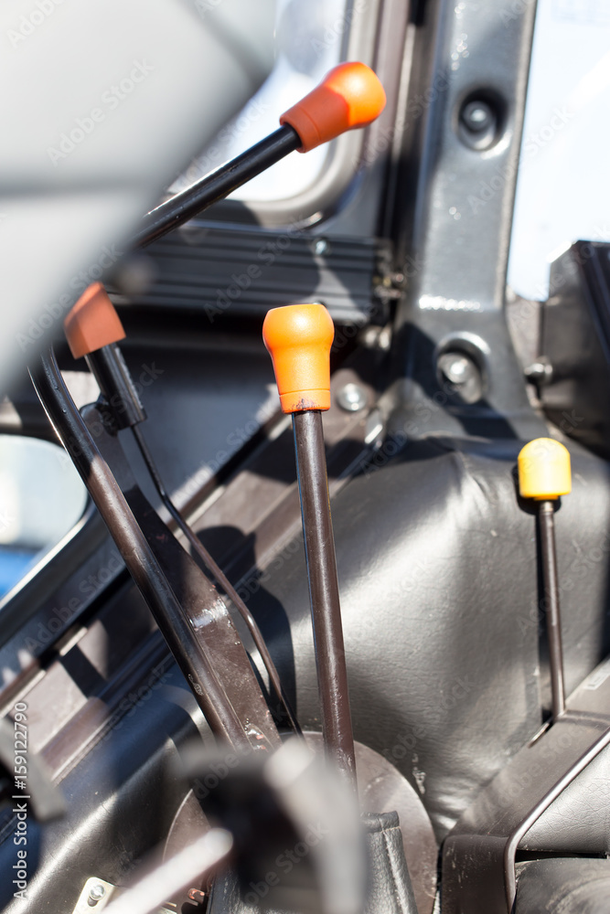 lever near the steering wheel on the tractor lever near the steering wheel on the tractor