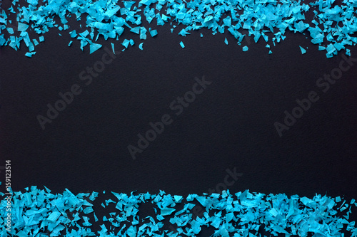 Confetti - blue confetti on a black background