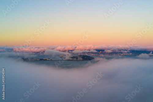 Aerial photo of fog rolling over the Bay Area