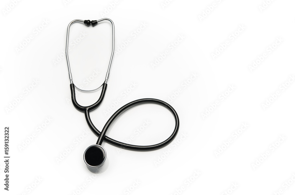 Stethoscope isolated on white background. Sterile doctors office desk. Medical accessories on a white table background with copy space around products. Photo taken from above. Stethoscope isolated on white background. Sterile doctors office desk. Medical accessories on a white table background with copy space around products. Photo taken from above.
