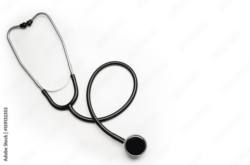 Stethoscope isolated on white background. Sterile doctors office desk. Medical accessories on a white table background with copy space around products. Photo taken from above. Stethoscope isolated on white background. Sterile doctors office desk. Medical accessories on a white table background with copy space around products. Photo taken from above.