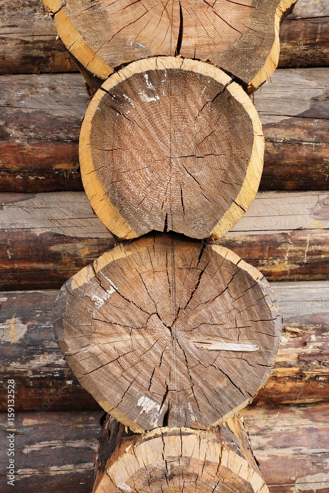 Naklejka premium Wooden background made of logs