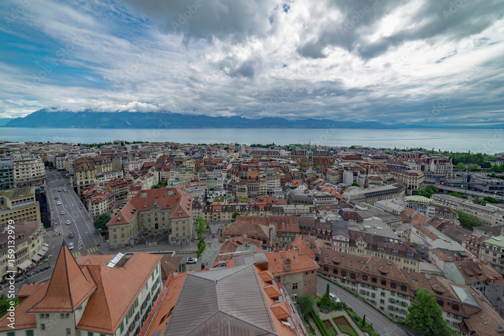 Lausanne cityscape skyline on a partly sunny, partly cloudy day