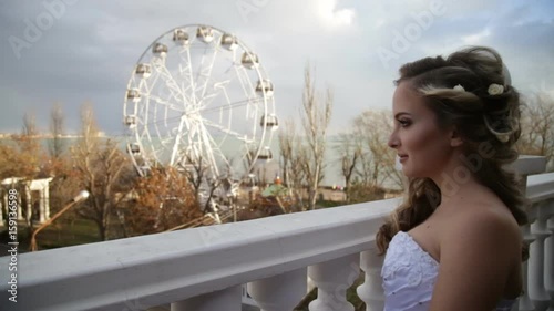 Morning of the bride. The bride goes to the window