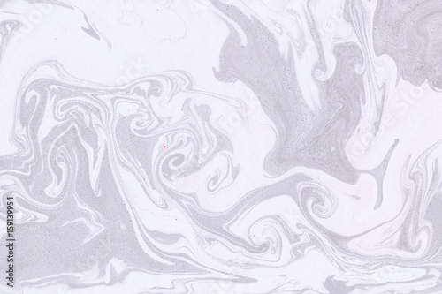 Suminagashi marble texture hand painted with black ink. Digital paper. Good-looking liquid abstract background.