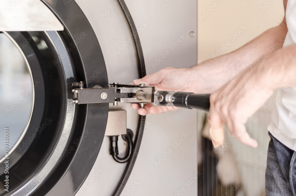 hand put laundry in the machine hand put laundry in the machine
