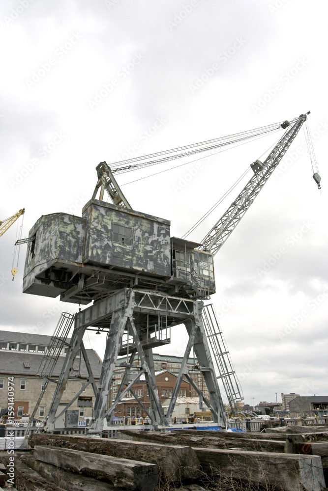 Obraz premium Historic Boston shipyard crane. Vertical.