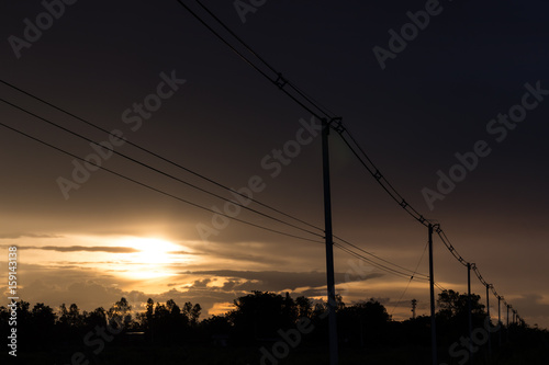 Power poles in the evening in the countryside.