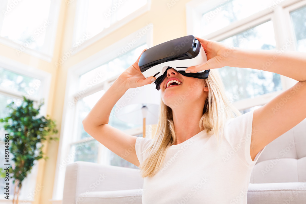 Young woman using virtual reality headset Young woman using virtual reality headset