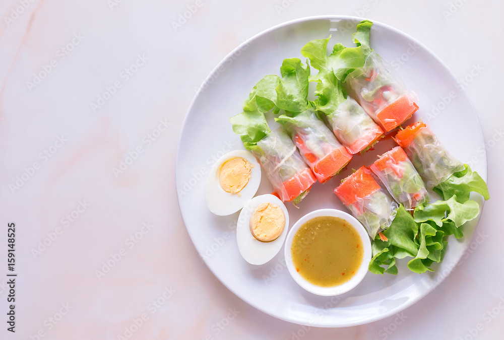 Fresh vegetable salad roll with boiled egg, Health care concept. Top view Fresh vegetable salad roll with boiled egg, Health care concept. Top view