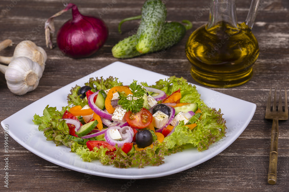 Fresh vegetable greek salad on the table Fresh vegetable greek salad on the table