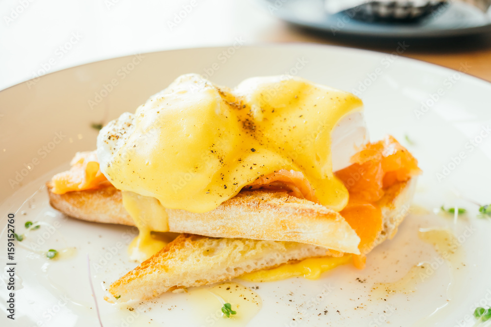 Eggs benedict with smoked salmon for breakfast Eggs benedict with smoked salmon for breakfast