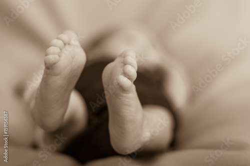 Closeup of tiny baby feet.