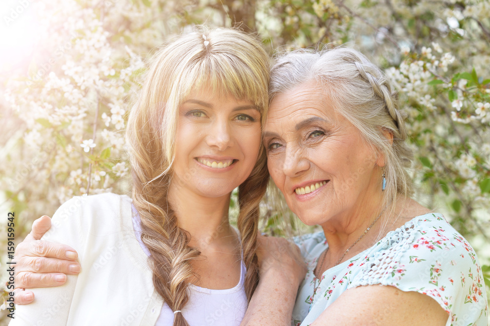 Beautiful young woman with mother Beautiful young woman with mother