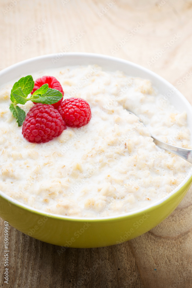 Oatmeal porridge in bowl with berries raspberries and blackberries. Oatmeal porridge in bowl with berries raspberries and blackberries.