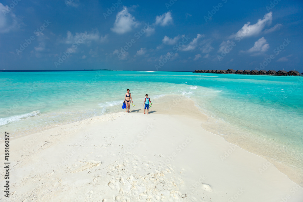 Mother and son at tropical beach