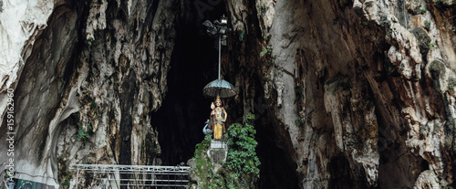Photography Hindu's divine statue in front of the cave of Batu Caves near Kuala Lumpur, Mala