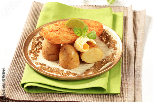 Fried fish fillet with new potatoes