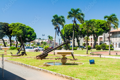 CAYENNE, FRENCH GUIANA - AUGUST 3, 2015: Old anchors at Place Leopold Heder square in Cayenne, capital of French Guiana.