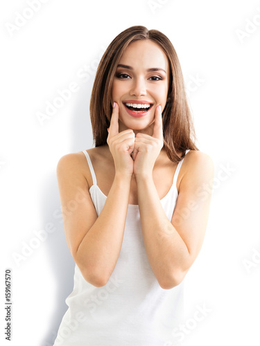 young woman showing smile photo