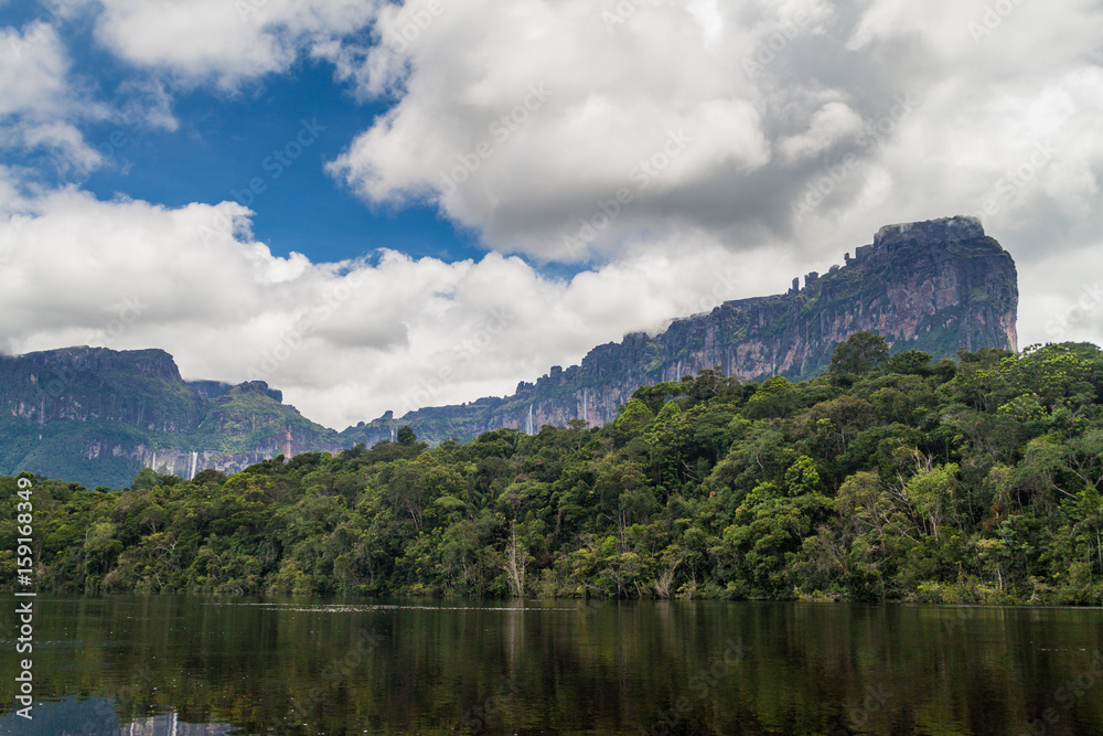 River Carrao and tepui (table mountain) Auyan in National Park Canaima, Venezuela.
