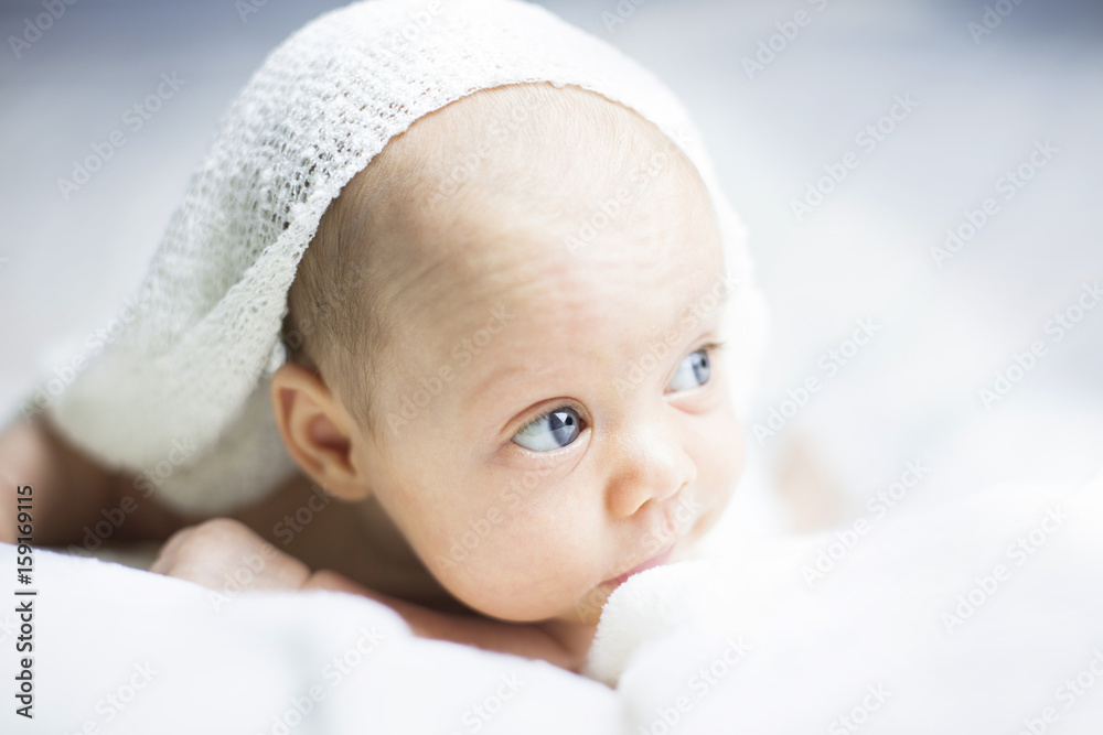 Beautiful baby girl on white blanket Beautiful baby girl on white blanket