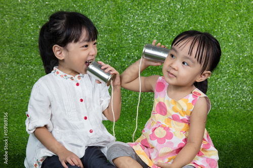 Asian Chinese Kids Playing with Tin Can Phone