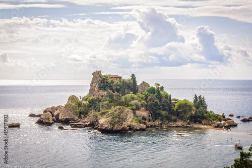 Isola Bella, also known as The Pearl of the Ionian Sea, is a small nature reserve island in a bay - Taormina, Sicily, Italy