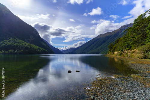 Beautiful scenery of Lake Gunn with Sun halo and reflection , South Island of New Zealand