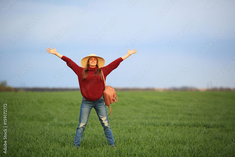 Inspired woman in the field, nature,green field, space, healthy lifestyle Inspired woman in the field, nature,green field, space, healthy lifestyle