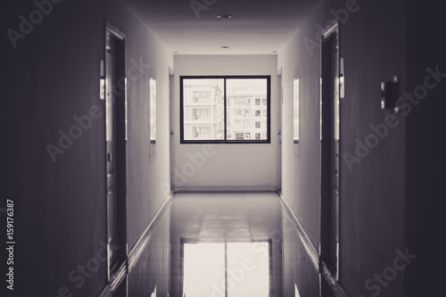 Photography The passageway in a residential building near the window has light in