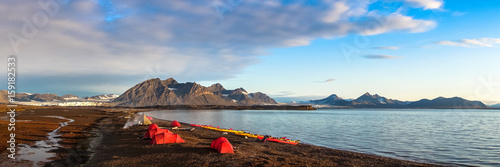 Campsite tents in Svalbard at midnight