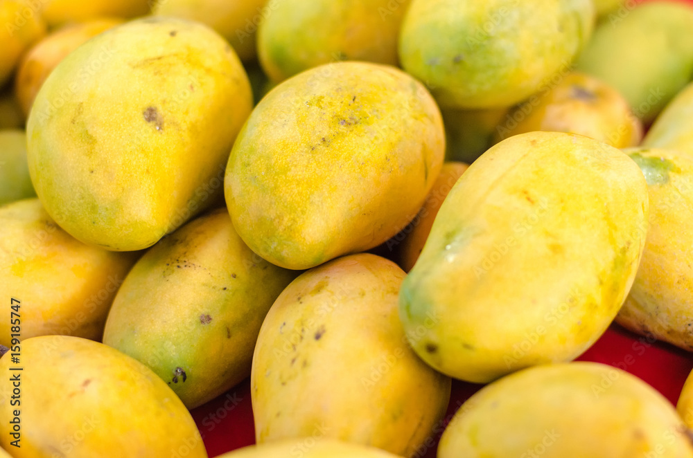 selective focus shot,fresh mangoes in the market